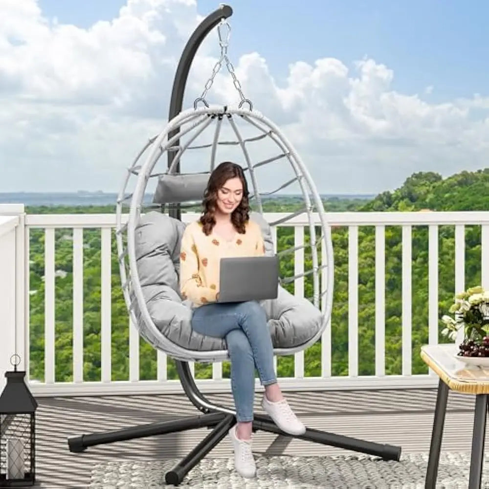  Relax in style with this cozy hanging egg chair!
